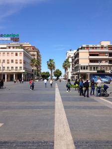 a group of people walking around a city street at Centralissimo Pescara in Pescara