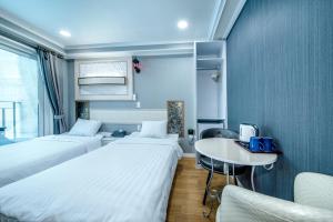 Postel nebo postele na pokoji v ubytování Mulddeule Shimpang Resort