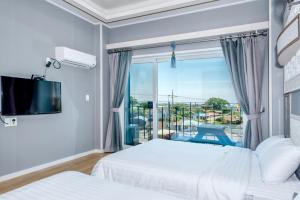 Postel nebo postele na pokoji v ubytování Mulddeule Shimpang Resort