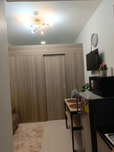 TV a/nebo společenská místnost v ubytování Fame Residences Tower 2