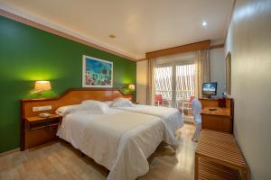 Posteľ alebo postele v izbe v ubytovaní Hotel Torrepalma
