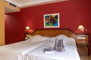 Posteľ alebo postele v izbe v ubytovaní Hotel Torrepalma