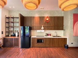 Kuchyň nebo kuchyňský kout v ubytování Minawa Kenhga Resort & Spa Ninh Binh