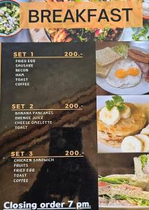 um menu para o buffet de pequeno-almoço num restaurante em Eden Lanta Bungalow em Phra Ae beach