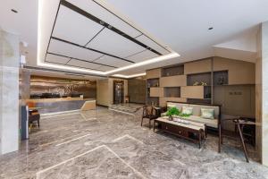 Kuchyň nebo kuchyňský kout v ubytování Guangzhou Yachen Hotel