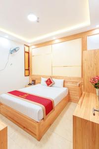 Postelja oz. postelje v sobi nastanitve Ngọc Sang 1 Hotel