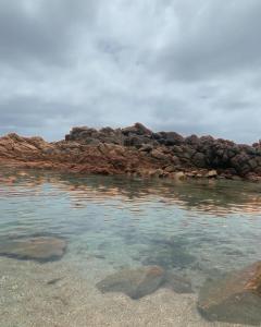 a group of rocks in the water at Panda's Patch Dunsborough in Dunsborough