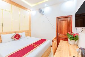 Postelja oz. postelje v sobi nastanitve Ngọc Sang 1 Hotel