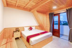 Postelja oz. postelje v sobi nastanitve Ngọc Sang 1 Hotel
