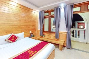 Postelja oz. postelje v sobi nastanitve Ngọc Sang 1 Hotel