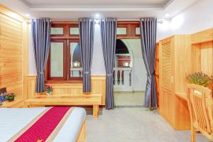 Postelja oz. postelje v sobi nastanitve Ngọc Sang 1 Hotel