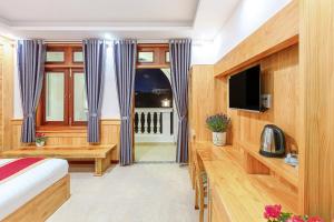 TV in/ali zabaviščno središče v nastanitvi Ngọc Sang 1 Hotel