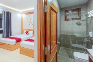 Kopalnica v nastanitvi Ngọc Sang 1 Hotel