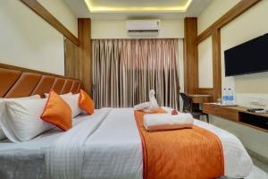 Postel nebo postele na pokoji v ubytování Hotel Archith