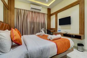 TV a/nebo společenská místnost v ubytování Hotel Archith