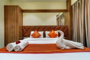 Postel nebo postele na pokoji v ubytování Hotel Archith