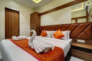 Postel nebo postele na pokoji v ubytování Hotel Archith