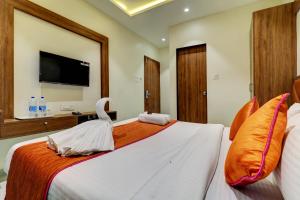 Postel nebo postele na pokoji v ubytování Hotel Archith