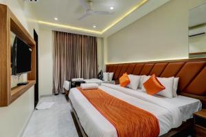 TV a/nebo společenská místnost v ubytování Hotel Archith
