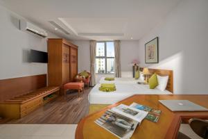 TV a/nebo společenská místnost v ubytování Richico Apartments And Hotel