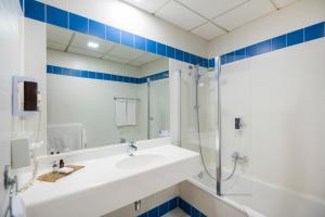 Koupelna v ubytování Hotel Landskron