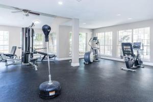 a gym with a vacuum in the middle of a room at Pelican Bay-galveston's Hideaway in Galveston