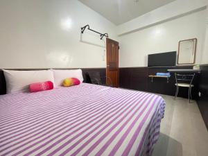Postel nebo postele na pokoji v ubytování Peace 28 B&B