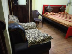 Llit o llits en una habitació de Hotel Pitambara Palace,Datia