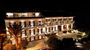 an aerial view of a building at night at Sunrise Hotel in Samos