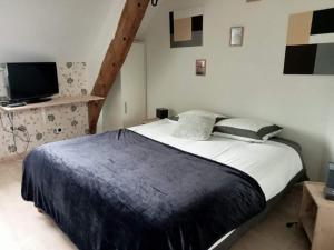 Postel nebo postele na pokoji v ubytování Relais de Moidrey