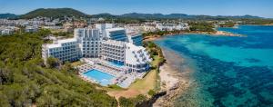 an aerial view of a resort on the beach at Melia Ibiza - Adults Only in Santa Eularia des Riu
