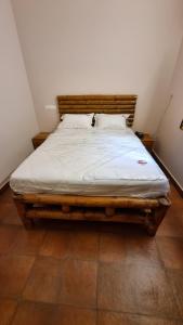 Postel nebo postele na pokoji v ubytování The Alpine Inn
