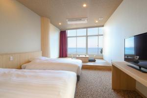 TV o dispositivi per l'intrattenimento presso Ooedo Onsen Monogatari Hotel Suiyotei