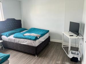 Cama o camas de una habitación en Flowealth Property