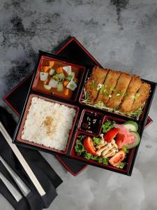 a plate of food with rice and other foods at Berjaya Hakkoda Ski Resort in Aomori