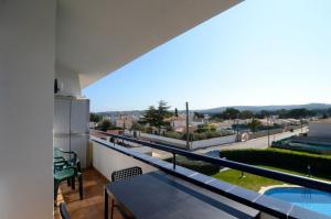 En balkon eller terrasse på Apartamentos Olimpia
