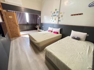 Postel nebo postele na pokoji v ubytování Peace 28 B&B