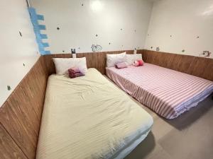 Postel nebo postele na pokoji v ubytování Peace 28 B&B