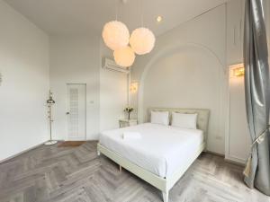 Postel nebo postele na pokoji v ubytování Nadda Pool Villa Ranong + 37 fotografií