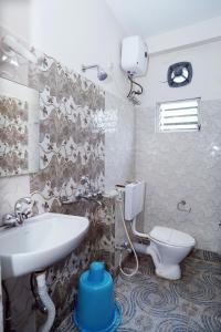 Kylpyhuone majoituspaikassa Sonar Bangla Guest House