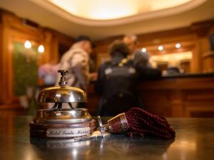 a close up of a bell on a table at Ca' Marinella in Venice