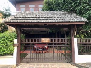 a gazebo with a sign that says yes shelter at SJ House in Chiang Mai