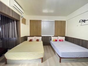 Postel nebo postele na pokoji v ubytování Peace 28 B&B