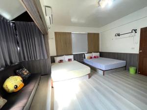 Postel nebo postele na pokoji v ubytování Peace 28 B&B