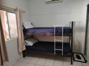 Двох'ярусне ліжко або двоярусні ліжка в номері Pousada Duna Village