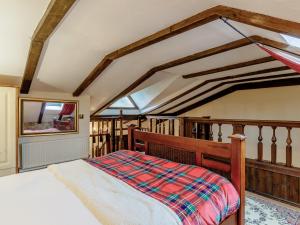 a bedroom with a bed in a room at 1 bed property in Gower 77981 in Penclawdd