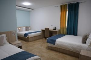 Ένα ή περισσότερα κρεβάτια σε δωμάτιο στο home in superior如家