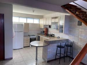Η κουζίνα ή μικρή κουζίνα στο Residencial Vista da Serra