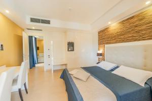 Postel nebo postele na pokoji v ubytování Prince Franklyn Hotel