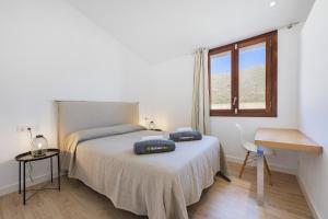 Posteľ alebo postele v izbe v ubytovaní Villa Vinya III
